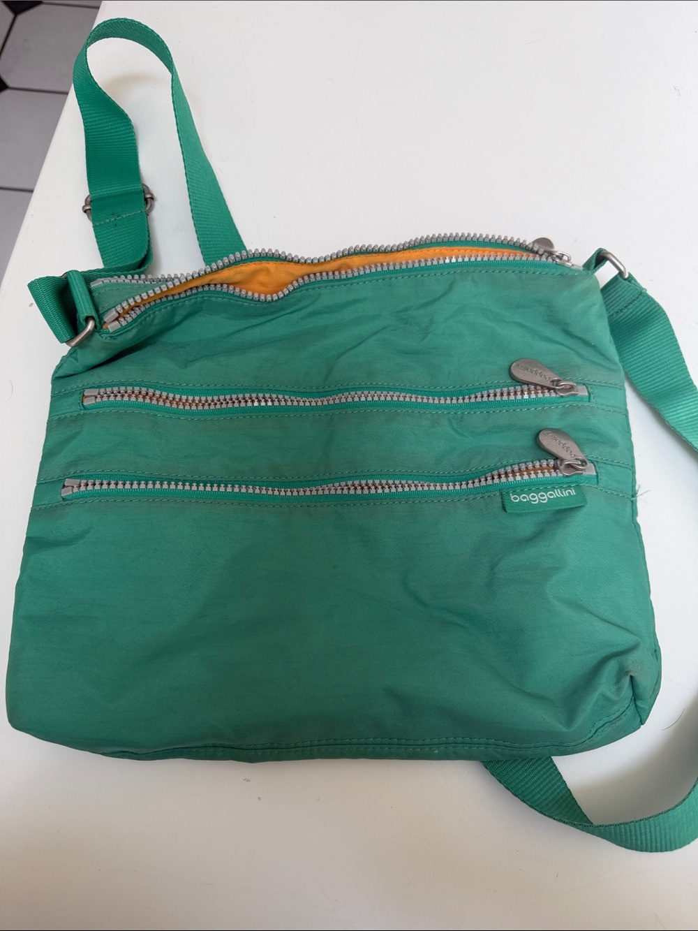 Baggallini Teal Green Crossbody Bag with Orange Interior